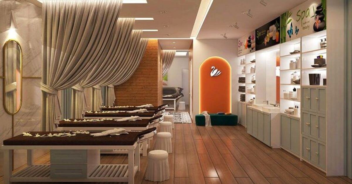 Spa sang trọng với giường massage và nội thất hiện đại, ánh sáng êm dịu tạo không gian thư giãn.