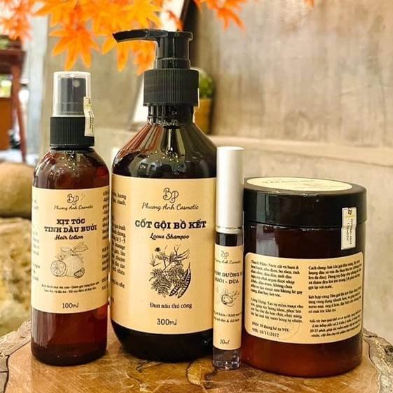 Bộ sản phẩm chăm sóc tóc từ thiên nhiên với xịt dưỡng bưởi, cốt gội bồ kết, và dưỡng môi bơ dừa.
