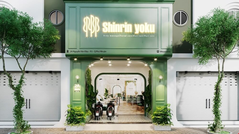 Mặt tiền của spa Shinrin Yoku, chuyên chăm sóc mặt, tóc và móng, thiết kế hiện đại với tông xanh lá cây.