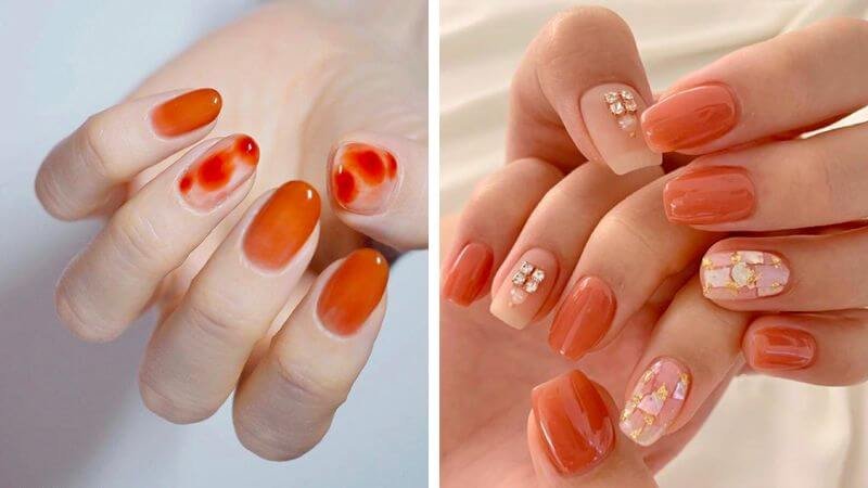 Hai bộ móng tay với sơn màu cam và họa tiết trang trí khác nhau.