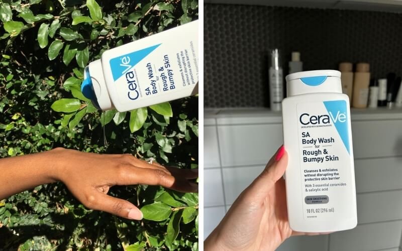 Bàn tay cầm chai sữa tắm CeraVe SA Body Wash, nền là lá cây và kệ với nhiều chai lọ khác.